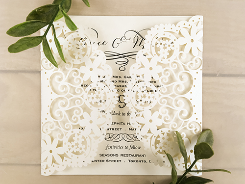 Invitation lc76: Ivory Shimmer, Cream Smooth - This is an open ivory shimmer gate fold style laser cut wedding invite.  The insert is loose.