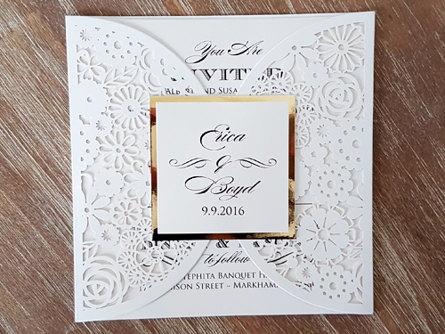 Invitation lc80: Ivory Shimmer, Gold Mirror, Cream Smooth - This is an ivory shimmer laser cut wedding invite.  The pattern has a lot of shapes.  There is a gold mirror layered cover tag on the flap.