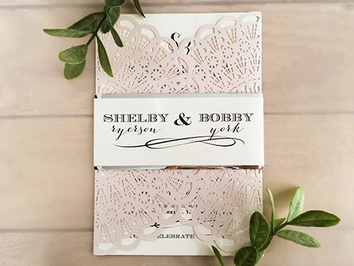 Invitation lc81: Blush Shimmer, Silver Mirror, Cream Smooth - This is a blush shimmer gate fold laser cut wedding invite.  The gate resembles a fan design.  There is a silver mirror layered belly band.