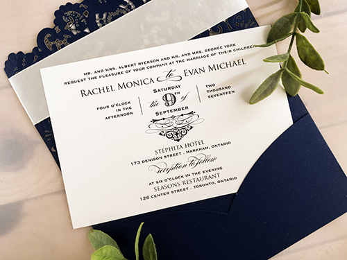 Invitation lc83: Glittering Navy, Cream Smooth, Antique Ribbon - This is a glittering navy pocket style laser cut wedding invitation.  There is a flat antique ribbon with champagne glitter layered cover tag.