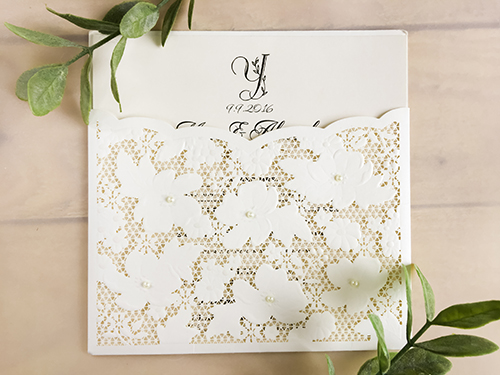 Invitation lc86: White, Cream Smooth - This is a laser cut pocket style wedding invitation.  There is a lace pattern on the pocket.