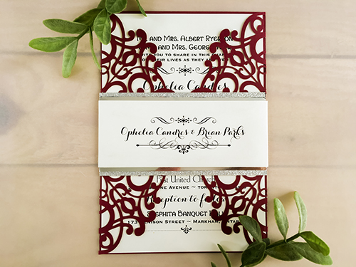Invitation lc93: Burgundy Shimmer, Silver Mirror, Cream Smooth - This is a burgundy shimmer gate fold style laser cut wedding invite.  There is a double layered belly band.