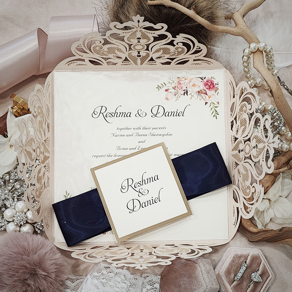 Invitation 8000: Ivory Shimmer, Gold Mirror, Cream Smooth, Navy Ribbon - 4 flap laser cut with ribbon and tag