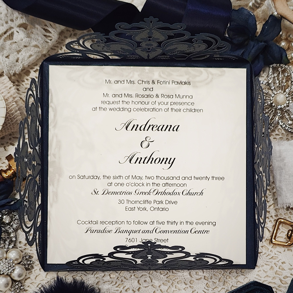 Invitation 8004: Glittering Navy, Cream Smooth - four flap navy lasercut envelopement with vellum band