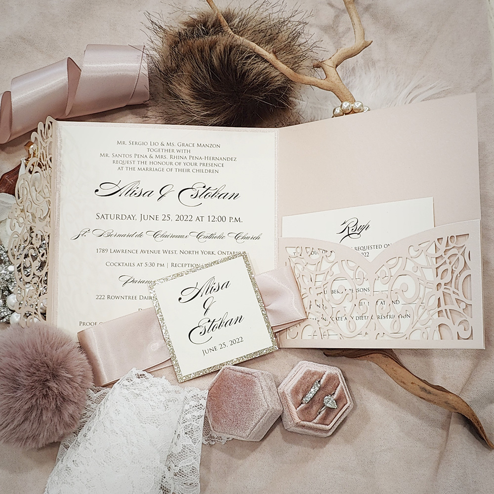 Invitation 8007: Blush Shimmer, Champagne Glitter, Cream Smooth, Blush Ribbon - Blush pocketfold lasercut with ribbon and layered tag