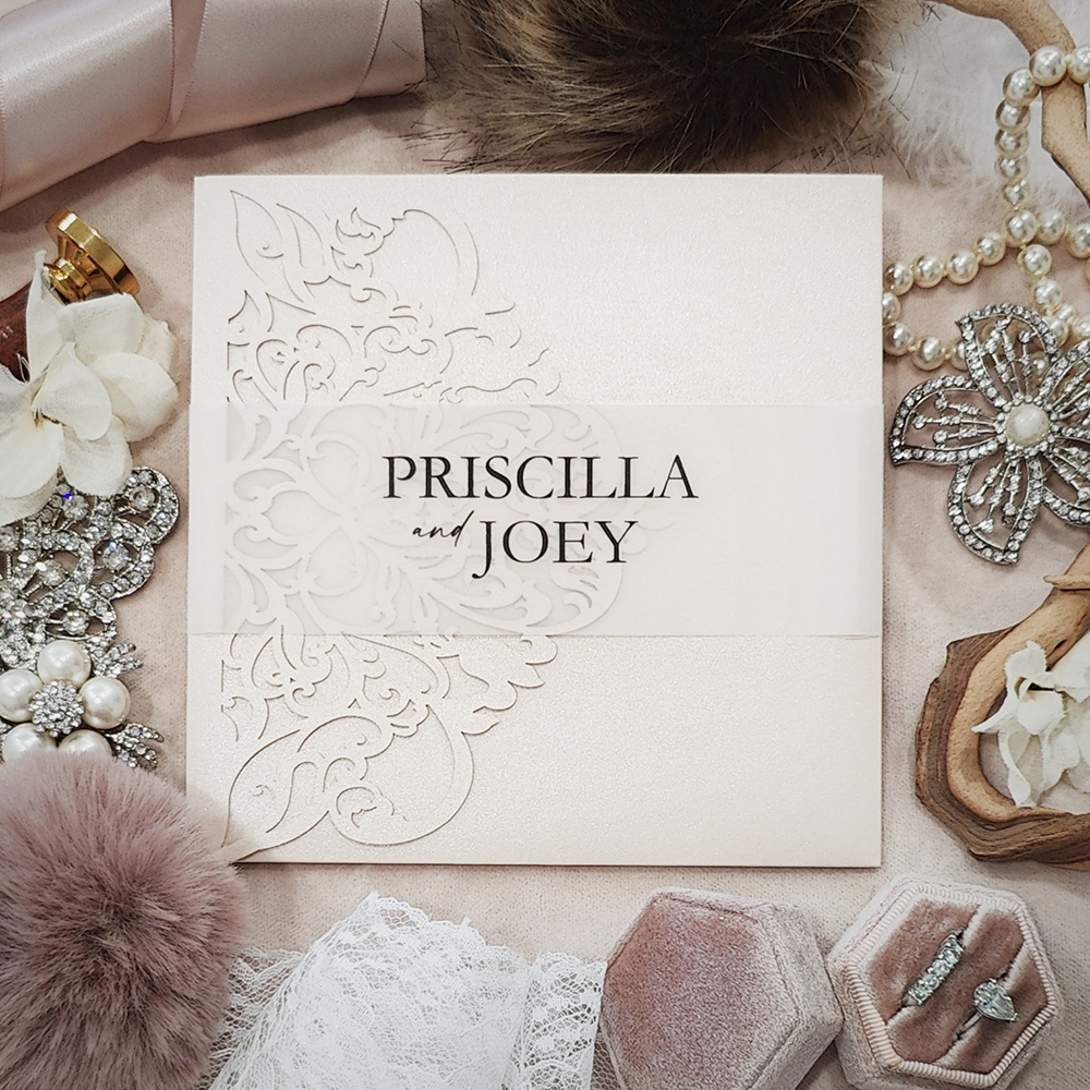 Invitation 8018: Ivory Shimmer, Cream Smooth - Ivory pocketfold lasercut with vellum band