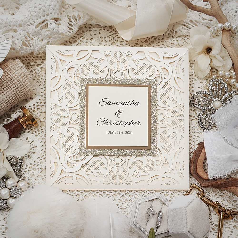 Invitation 8019: Ivory Shimmer, Gold Mirror, Cream Smooth - four flap envelopement lasercut with double layered tag