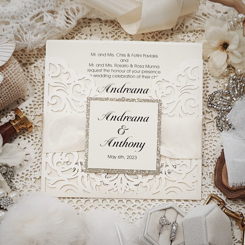 Invitation 8026: Ivory Shimmer, Champagne Glitter, Cream Smooth, Antique Ribbon - single panel pocket lasercut with ribbon and layered tag