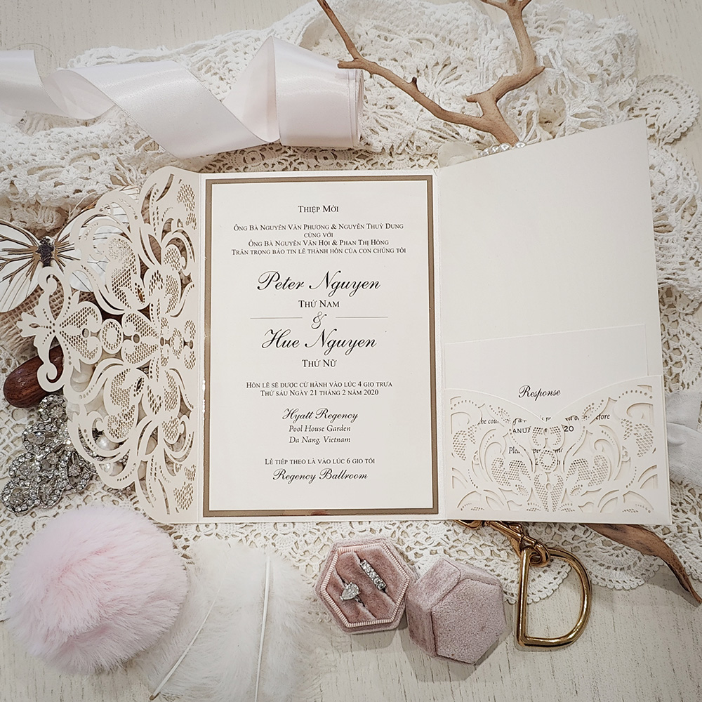 Invitation 8038: Ivory Shimmer, Cream Smooth, Ivory Wax, Petal Pink Ribbon - Ivory pocketfold lasercut with ribbon and wax seal