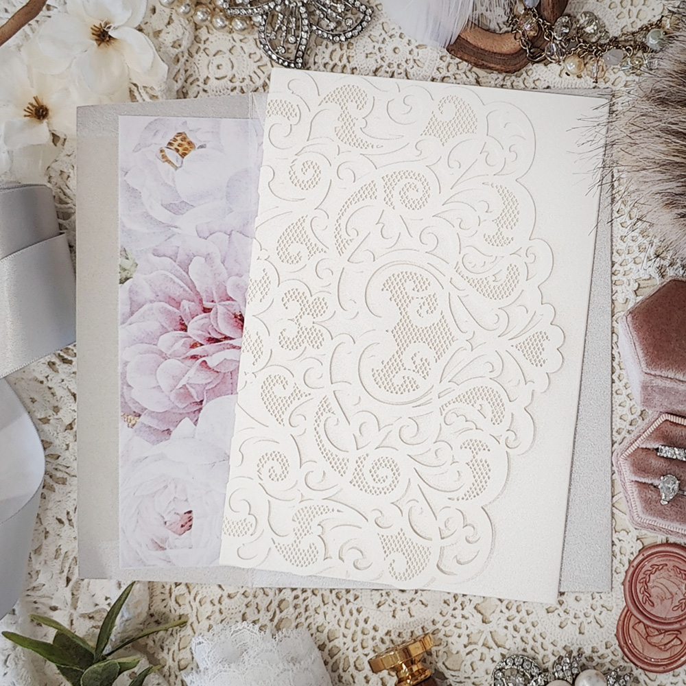 Invitation 8042: Ivory Shimmer, Cream Smooth - This is the damask flap design laser cut in a pocketfolder design.