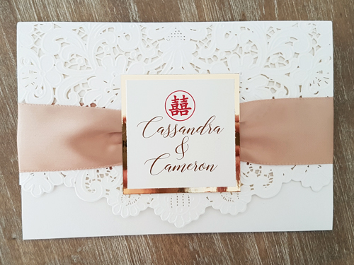 Invitation mb11: Ivory Shimmer, Gold Mirror, Cream Smooth, Champagne Ribbon - This is a pocket style laser cut folder in the ivory shimmer color.  There is a champagne ribbon wrapped around the cover and layered cover tag.