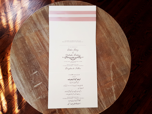 Invitation mb25: White Gold, Deep Blush Ribbon, Antique Ribbon, Brooch/Buckle A20 - This is a full flap pocketfolder wedding invite using the white gold paper.  There is a double ribbon stripe and brooch design on the cover flap.