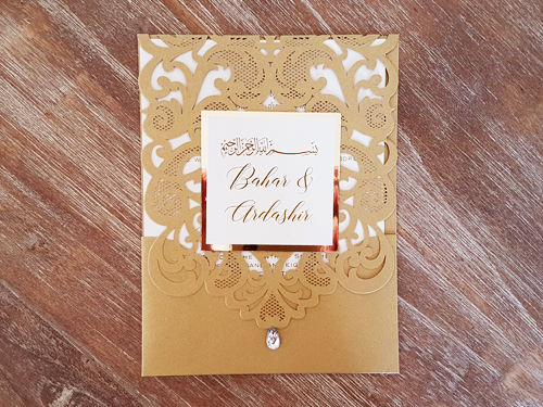 Invitation mb27: Metallic Gold, Gold Mirror, Cream Smooth - This is a metallic gold laser cut pocket invitation with a rhinestone jewel on the cover flap.  There is also an extra layered cover tag on the cover.