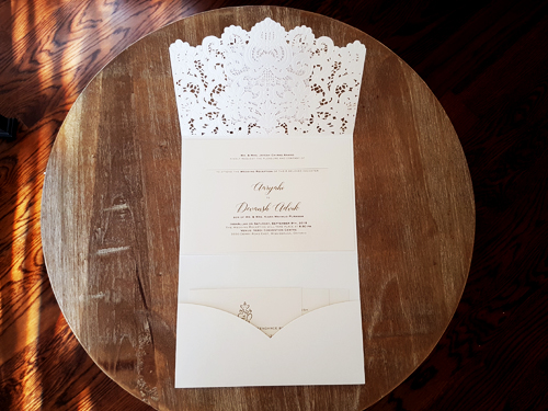 Invitation mb2: Ivory Shimmer, Gold Pearl, Cream Smooth - This is an ivory shimmer laser cut pocket design.  There is a double layered cover tag on the flap.