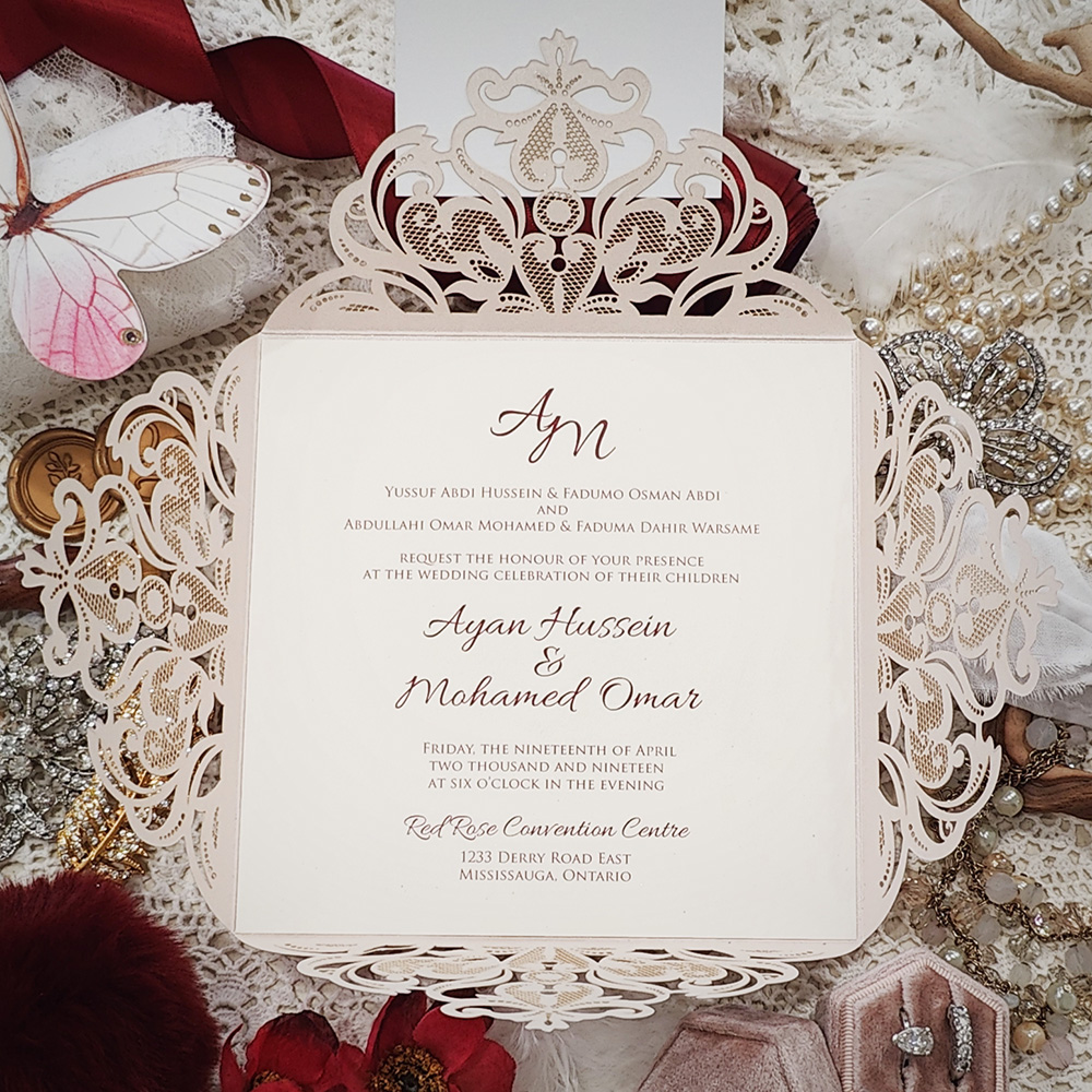 Invitation 8104: Ivory Shimmer, Red Lacquer, Cream Smooth - four flap lasercut with bismillah gold mirror and red lacquer border layered tag