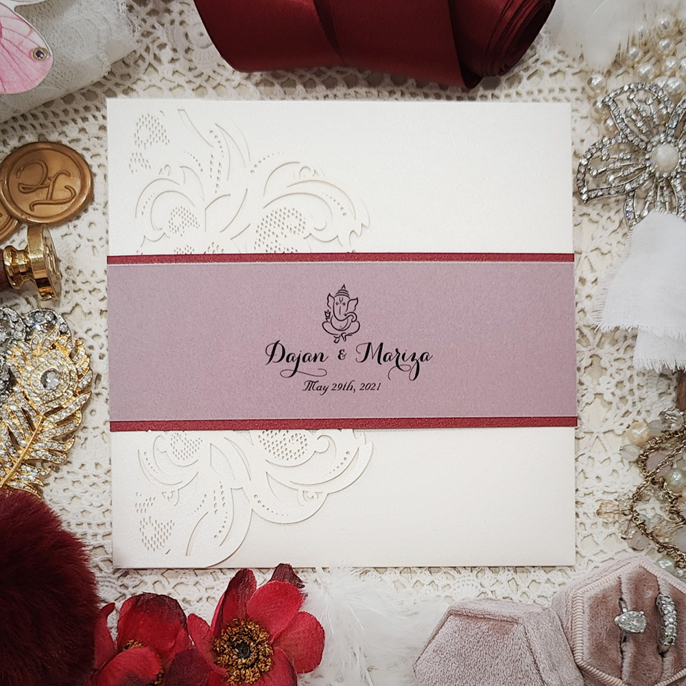 Invitation 8106: Ivory Shimmer, Red Lacquer, Cream Smooth - Pocketfolder lasercut ivory shimmer with layered vellum band with Ganesh