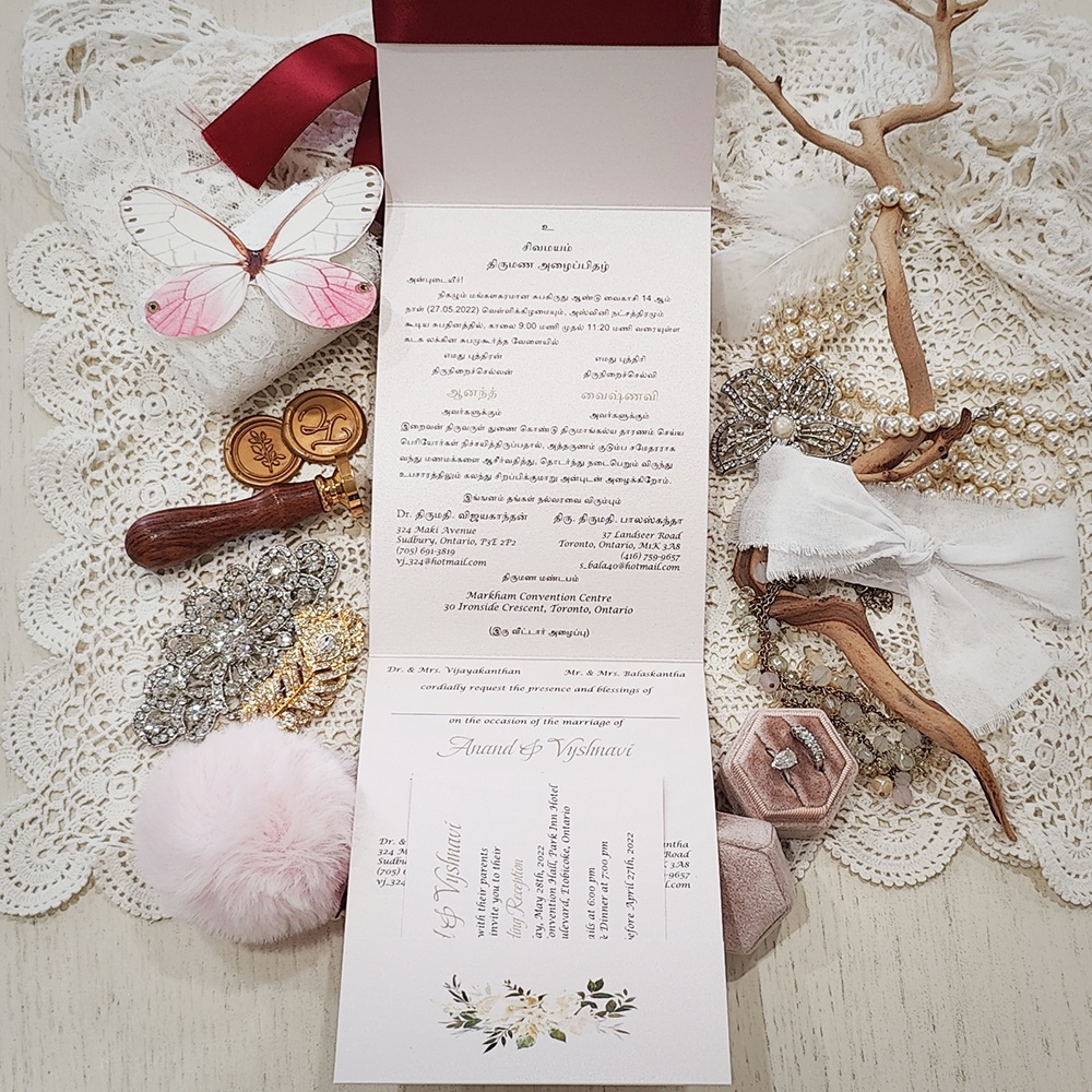 Invitation 8108: Light Pink Pearl, Champagne Glitter, Cream Smooth, Sherry Ribbon - Ganesh pocketfold in light pink pearl with sherry ribbon and layered glitter tag