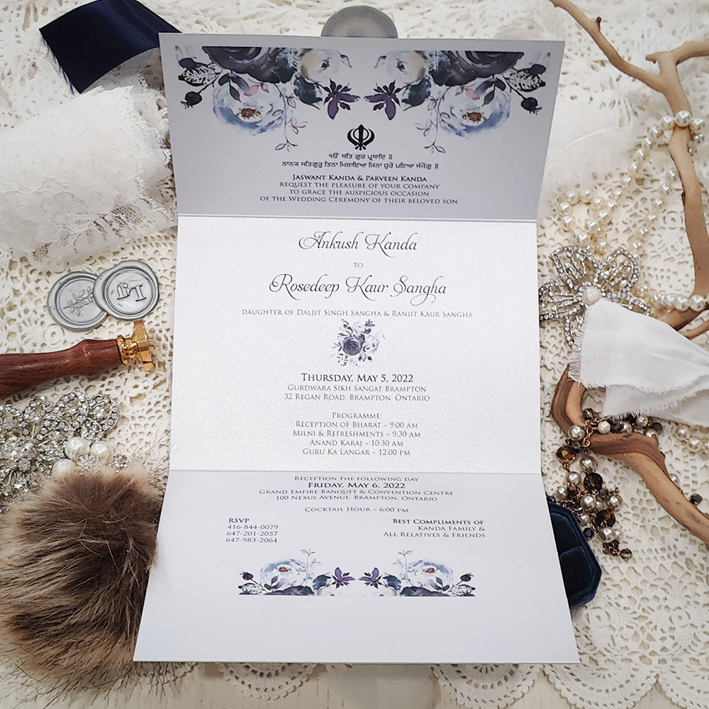 Invitation 8118: White Silver, Silver Wax - Silver pocketfold invite with silver ek onkar stamp and navy floral design