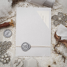 Invitation 3401: Silver Ore, Silver Wax, String Ribbon - Silver pocket design with a loose insert and string and wax seal wrapped.