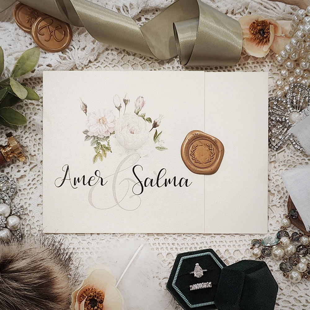 Invitation 3116: White Gold, Gold Wax - Landscape trifold pocketfolder wedding invite that opens horizontally with a gold wax seal on the cover flap.