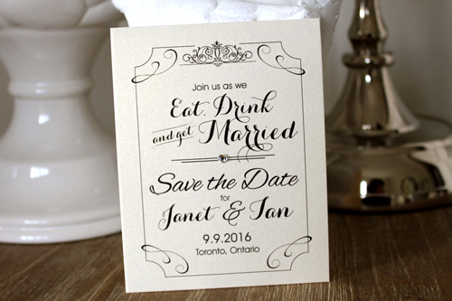 Invitation SavetheDate13: White Gold - Eat, Drink and be Married design on the save the date invite.  There is a border design around the text.