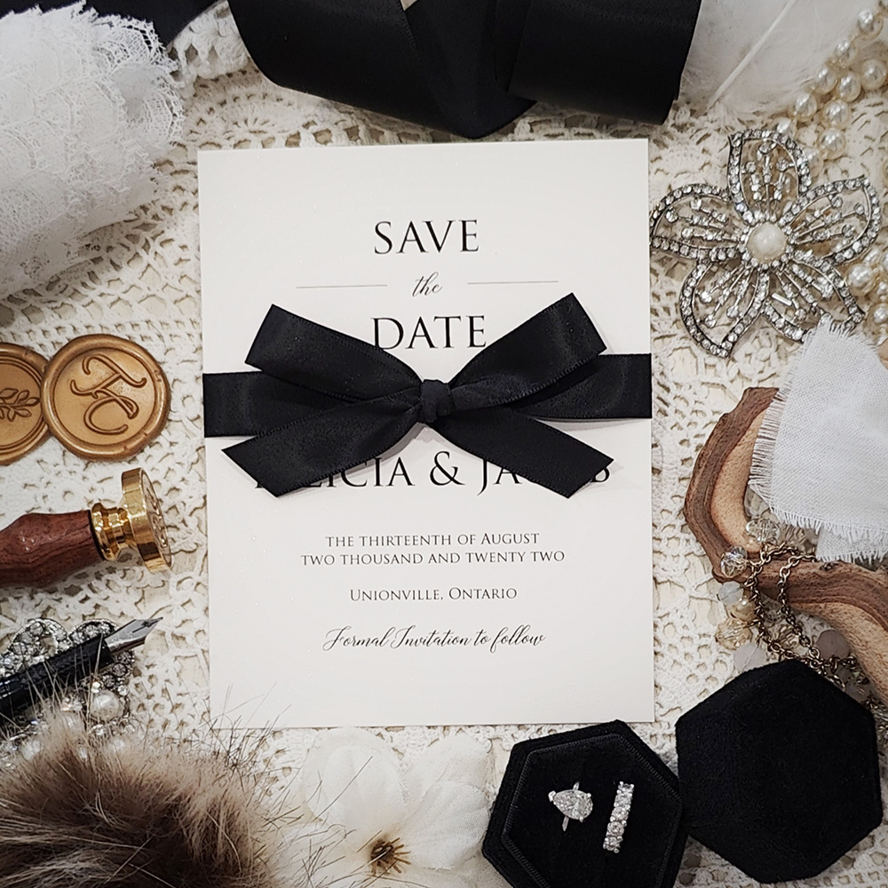 Invitation 8311:  - save the date on white gold with black bow