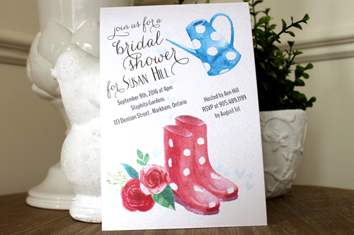 Invitation S43: Ice Pearl - This is a bridal shower invitation with a garden theme.  There is a watering can, along with red and white boots and florals.