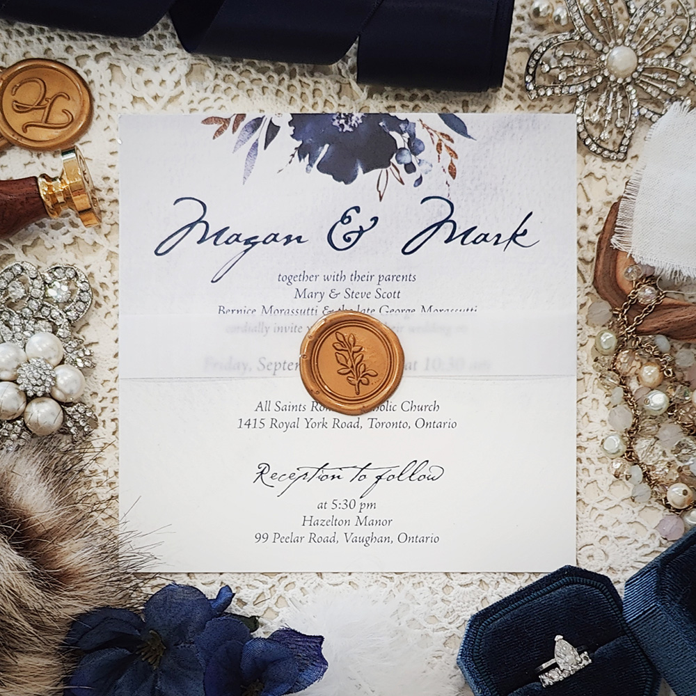 Invitation 3015: Ice Pearl, Gold Wax - Single card wedding invitation with a floral print at the top.  It is wrapped with a vellum wrap and gold branch wax seal.