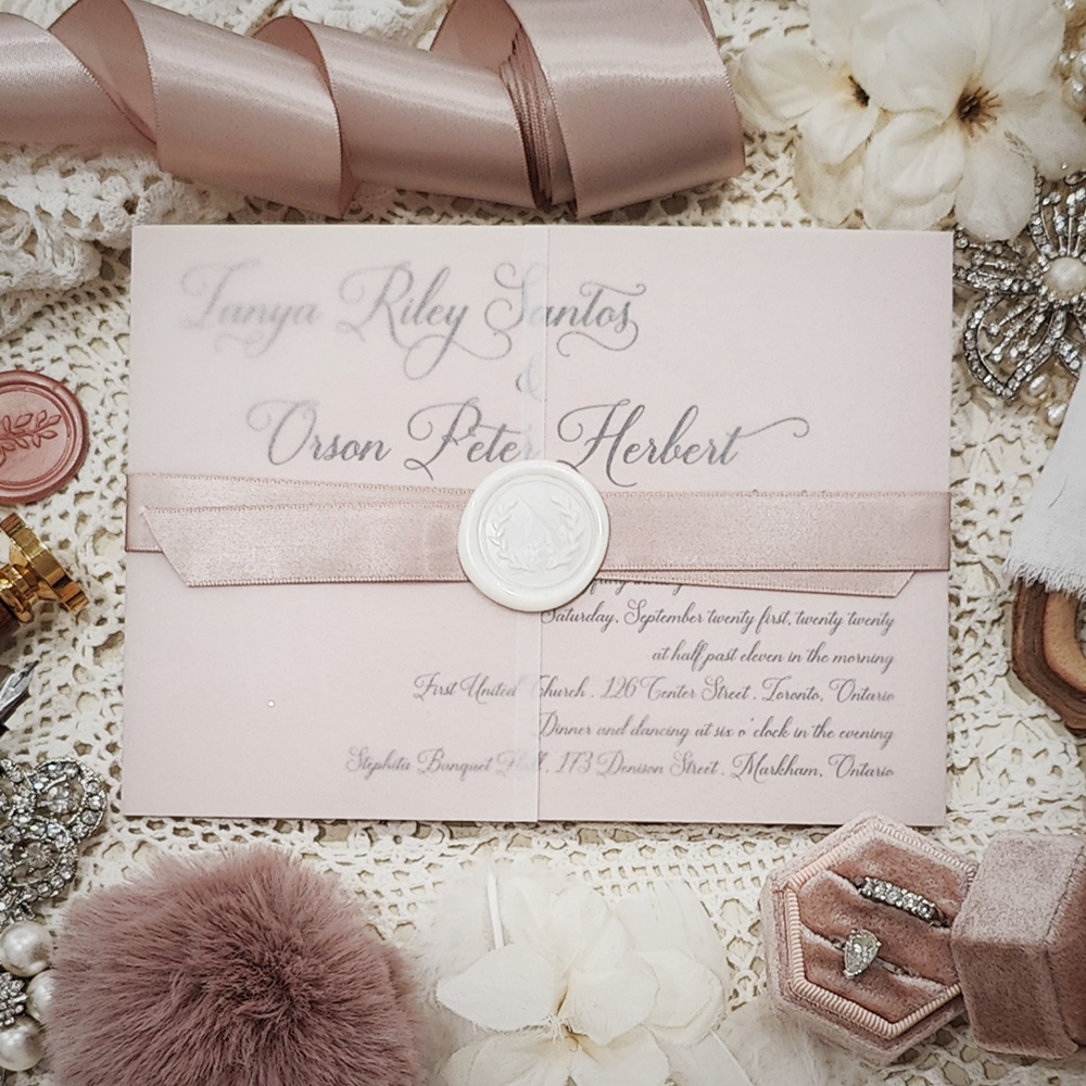 Invitation 3207: Blush Pearl, Ivory Wax, Blush Ribbon - Landscape single card with a clear vellum wrap and blush ribbon and ivory wax seal.