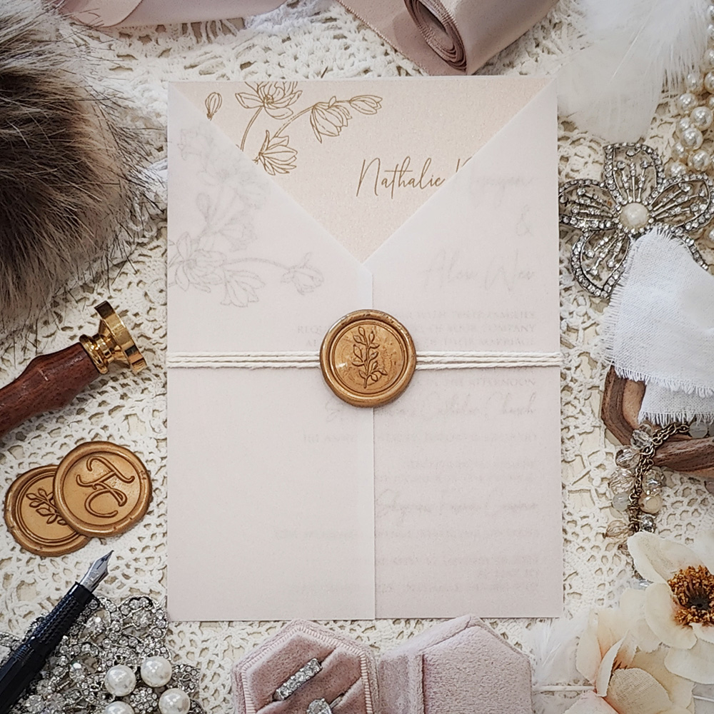 Invitation 3211: Blush Pearl, Gold Wax, String Ribbon - Single card on a blush paper with a clear vellum wrap, string and gold wax seal.