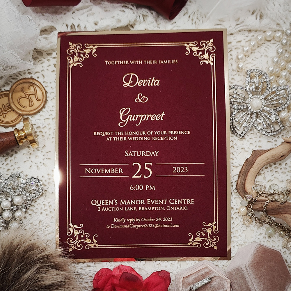 Invitation 5411: Burgundy Velvet, Gold Mirror - Burgundy Velvet wedding invitation with gold mirror backing.  The layout is gold foil pressed.