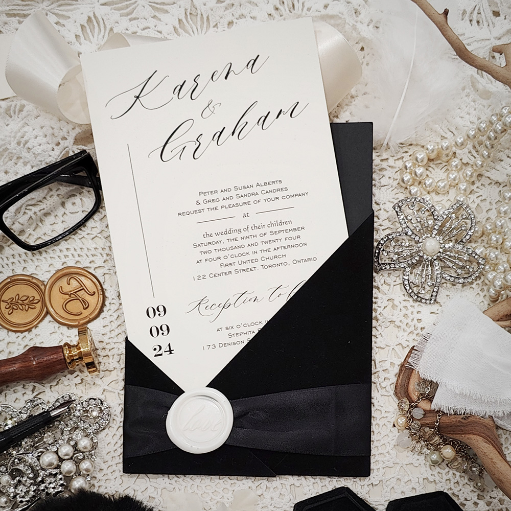 Invitation 5412: Black Velvet, Cream Smooth, Ivory Wax, Black Ribbon - Black velvet wedding pocket style with a black ribbon and ivory wax seal.