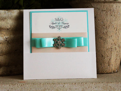 Invitation 765: Antique Pearl, Tiffany Pearl, Cream Smooth, Blush Ribbon, Aqua Ribbon, Aqua Ribbon, Aqua Ribbon, Brooch/Buckle A18