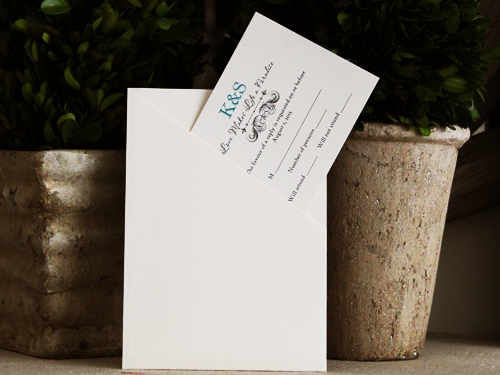 Invitation 777: Ivory Pearl, Cream Smooth, Tangerine Ribbon, Peacock Ribbon, Brooch/Buckle A10