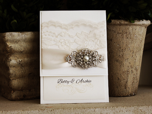 Invitation 1010: Antique Pearl, Antique Pearl, Cream Smooth, Antique Ribbon, Cream Lace, Brooch/Buckle A6, Metal Filigree F4 - Silver